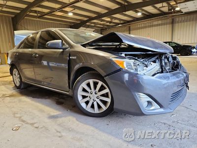 Czwarte zdjęcie samochodu z boku: 2012 TOYOTA CAMRY HYBRID XLE VIN:4T1BD1FKXCU002617 - miniatura