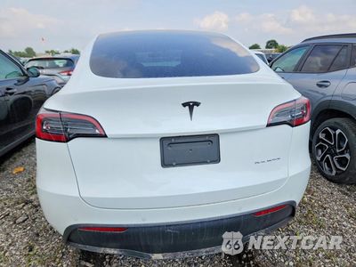 Zdjęcie 6 z 13 samochodu: 2022 TESLA MODEL Y VIN:7SAYGDEE9NF441065 - miniatura