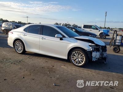 Czwarte zdjęcie samochodu z boku: 2019 TOYOTA CAMRY XLE VIN:4T1B11HKXKU708796 - miniatura