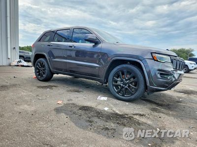 Czwarte zdjęcie samochodu z boku: 2020 JEEP GRAND CHEROKEE LAREDO VIN:1C4RJEAG7LC392071 - miniatura