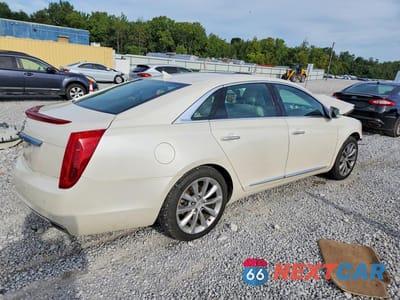 Trzecie zdjęcie samochodu z tyłu: 2013 CADILLAC XTS PREMIUM COLLECTION VIN:2G61T5S31D9102874 - miniatura