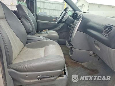 Zdjęcie 7 z 13 samochodu: 2004 DODGE GRAND CARAVAN SXT VIN:2D4GP44L34R563810 - miniatura