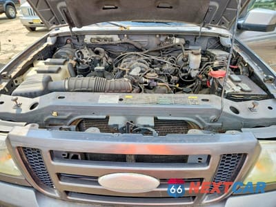 Zdjęcie 11 z 12 samochodu: 2010 FORD RANGER SUPER CAB VIN:1FTLR4FEXAPA03817 - miniatura