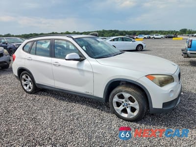 Czwarte zdjęcie samochodu z boku: 2013 BMW X1 SDRIVE28I VIN:WBAVM1C55DVL64072 - miniatura