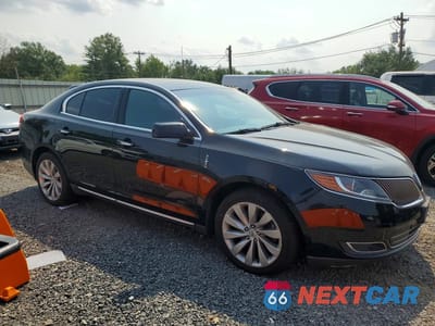 Czwarte zdjęcie samochodu z boku: 2016 LINCOLN MKS VIN:1LNHL9EK9GG603194 - miniatura