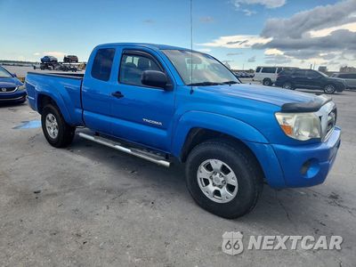 Czwarte zdjęcie samochodu z boku: 2010 TOYOTA TACOMA V6 VIN:5TEUU4EN9AZ734574 - miniatura