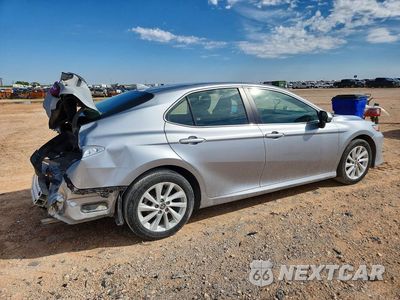 Trzecie zdjęcie samochodu z tyłu: 2024 TOYOTA CAMRY LE VIN:4T1C11AK3RU886476 - miniatura