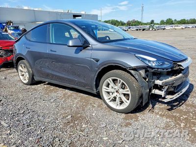 Czwarte zdjęcie samochodu z boku: 2022 TESLA MODEL Y VIN:7SAYGDEE0NF354056 - miniatura