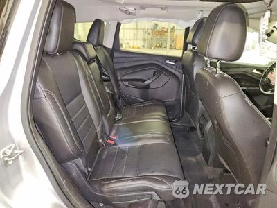 Zdjęcie 11 z 13 samochodu: 2014 FORD ESCAPE TITANIUM VIN:1FMCU9J92EUC50841 - miniatura