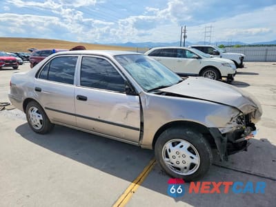 Czwarte zdjęcie samochodu z boku: 2000 TOYOTA COROLLA VE VIN:1NXBR12E2YZ393142 - miniatura