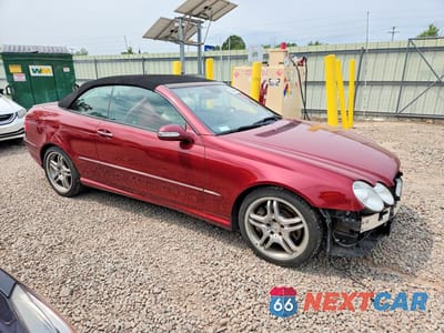 Czwarte zdjęcie samochodu z boku: 2009 MERCEDES-BENZ CLK 550 VIN:WDBTK72F69T102530 - miniatura