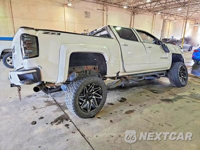 Trzecie zdjęcie samochodu z tyłu: 2017 CHEVROLET SILVERADO K1500 LT VIN:3GCUKREC7HG462064 - miniatura