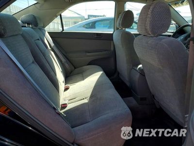 Zdjęcie 10 z 12 samochodu: 2002 TOYOTA CAMRY LE VIN:JTDBE32K320056835 - miniatura