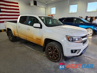 Czwarte zdjęcie samochodu z boku: 2017 CHEVROLET COLORADO LT VIN:1GCGTCEN3H1164103 - miniatura