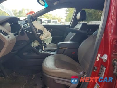 Zdjęcie 7 z 14 samochodu: 2013 HYUNDAI TUCSON GLS VIN:KM8JU3AC2DU606011 - miniatura