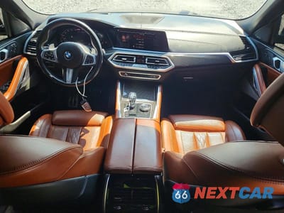 Zdjęcie 8 z 13 samochodu: 2021 BMW X6 M50I VIN:5UXCY8C03M9E36666 - miniatura