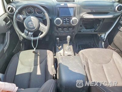 Zdjęcie 8 z 13 samochodu: 2015 JEEP WRANGLER UNLIMITED SAHARA VIN:1C4HJWEGXFL567204 - miniatura