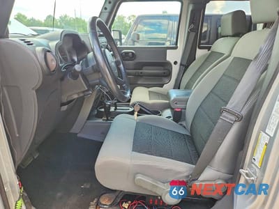 Zdjęcie 7 z 12 samochodu: 2010 JEEP WRANGLER UNLIMITED RUBICON VIN:1J4BA6H18AL133962 - miniatura