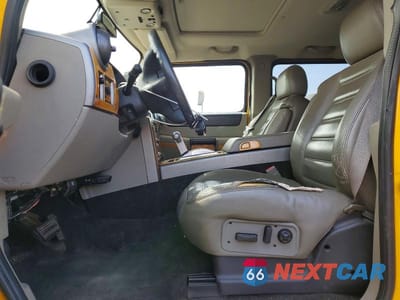 Zdjęcie 7 z 12 samochodu: 2003 HUMMER H2 VIN:5GRGN23U93H121690 - miniatura