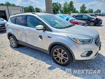 Czwarte zdjęcie samochodu z boku: 2017 FORD ESCAPE SE VIN:1FMCU0GD3HUC20291 - miniatura