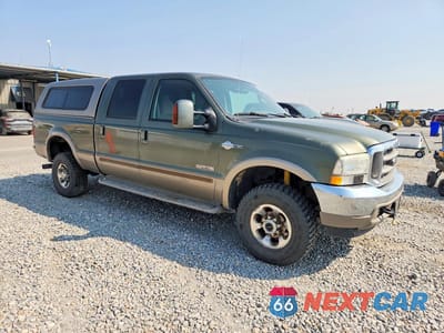 Czwarte zdjęcie samochodu z boku: 2004 FORD F350 SRW SUPER DUTY VIN:1FTSW31P84EA63215 - miniatura