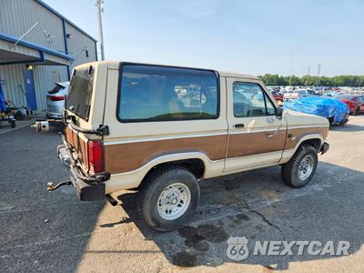 Trzecie zdjęcie samochodu z tyłu: 1985 FORD BRONCO II VIN:1FMCU14S3FUA49774 - miniatura