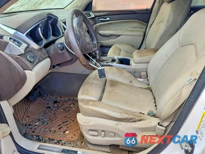 Zdjęcie 7 z 12 samochodu: 2003 CADILLAC SRX VIN:3GYFNKE40AS644489 - miniatura