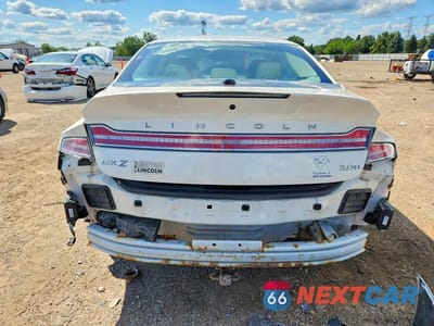 Zdjęcie 6 z 13 samochodu: 2013 LINCOLN MKZ HYBRID VIN:3LN6L2LU1DR809651 - miniatura