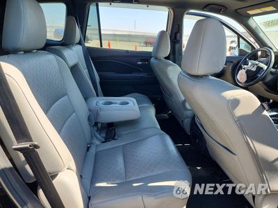 Zdjęcie 11 z 13 samochodu: 2019 HONDA PASSPORT ELITE VIN:5FNYF8H03KB021840 - miniatura