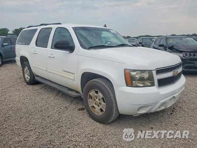 Czwarte zdjęcie samochodu z boku: 2011 CHEVROLET SUBURBAN VIN:1GNSCHE06BR118535 - miniatura