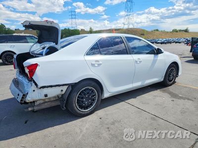 Trzecie zdjęcie samochodu z tyłu: 2014 TOYOTA CAMRY VIN:4T4BF1FK2ER432791 - miniatura