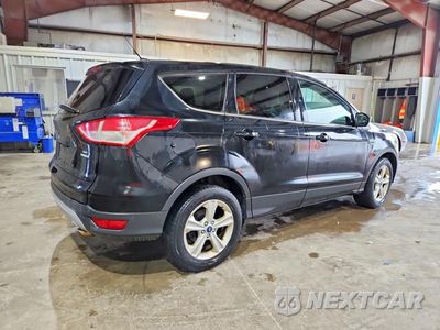 Trzecie zdjęcie samochodu z tyłu: 2016 FORD ESCAPE SE VIN:1FMCU9GX1GUB50061 - miniatura