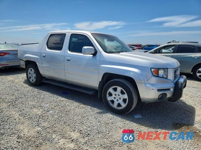 Czwarte zdjęcie samochodu z boku: 2006 HONDA RIDGELINE RTL VIN:2HJYK16516H513215 - miniatura