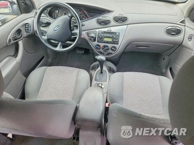 Zdjęcie 8 z 12 samochodu: 2004 FORD FOCUS ZX5 VIN:3FAHP37Z64R111023 - miniatura