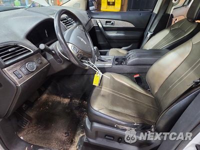 Zdjęcie 7 z 13 samochodu: 2011 LINCOLN MKX VIN:2LMDJ8JK6BBJ19282 - miniatura