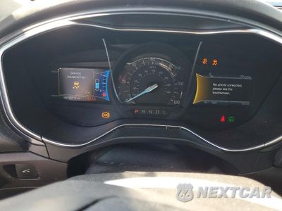 Zdjęcie 9 z 12 samochodu: 2013 FORD FUSION TITANIUM HEV VIN:3FA6P0RU1DR282141 - miniatura