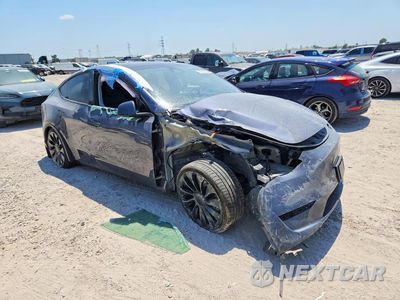 Czwarte zdjęcie samochodu z boku: 2023 TESLA MODEL Y VIN:7SAYGDEF7PF874976 - miniatura