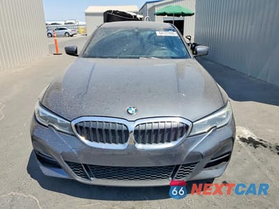Piąte zdjęcie samochodu w środku: 2020 BMW 330I VIN:3MW5R1J04L8B15627 - miniatura