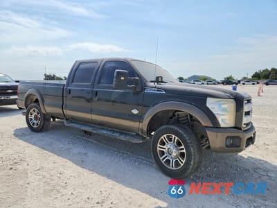 Czwarte zdjęcie samochodu z boku: 2016 FORD F350 SUPER DUTY VIN:1FT8W3BT1GEB14130 - miniatura