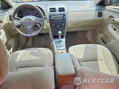 Zdjęcie 8 z 12 samochodu: 2009 TOYOTA COROLLA LE VIN:JTDBL40E599042756 - miniatura