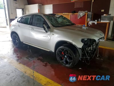 Czwarte zdjęcie samochodu z boku: 2013 BMW X6 XDRIVE35I VIN:5UXFG2C51DL786662 - miniatura