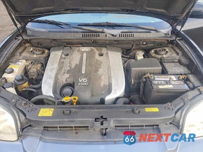 Zdjęcie 12 z 13 samochodu: 2005 HYUNDAI SANTA FE GLS VIN:KM8SC73EX5U865134 - miniatura