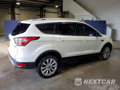 Trzecie zdjęcie samochodu z tyłu: 2017 FORD ESCAPE TITANIUM VIN:1FMCU0J95HUD06934 - miniatura