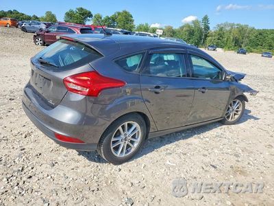 Trzecie zdjęcie samochodu z tyłu: 2015 FORD FOCUS SE VIN:1FADP3K20FL302060 - miniatura