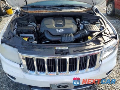 Zdjęcie 12 z 13 samochodu: 2013 JEEP GRAND CHEROKEE LIMITED VIN:1C4RJEBG7DC642506 - miniatura