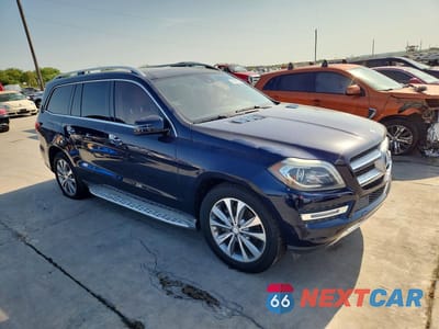 Czwarte zdjęcie samochodu z boku: 2015 MERCEDES-BENZ GL 450 4MATIC VIN:4JGDF6EE7FA449245 - miniatura