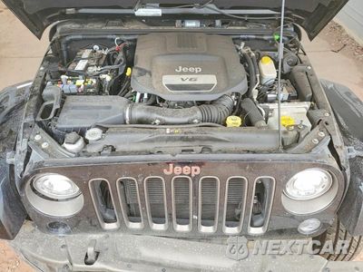 Zdjęcie 12 z 13 samochodu: 2017 JEEP WRANGLER UNLIMITED SAHARA VIN:1C4BJWEG5HL564672 - miniatura