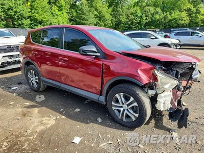 Czwarte zdjęcie samochodu z boku: 2018 TOYOTA RAV4 LE VIN:2T3BFREV1JW849115 - miniatura