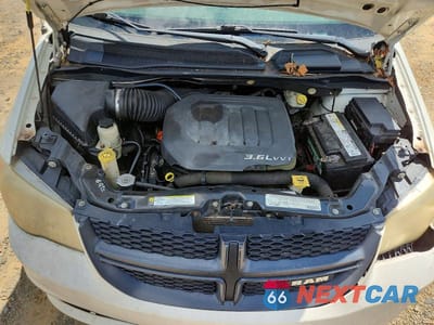 Zdjęcie 12 z 13 samochodu: 2012 DODGE RAM VAN VIN:2C4RDGAG1CR277539 - miniatura