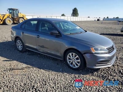 Czwarte zdjęcie samochodu z boku: 2015 VOLKSWAGEN JETTA SE VIN:3VWD17AJ0FM208994 - miniatura